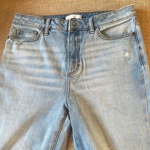 Gently worn (once) LC Lauren Conrad size 12 stretch ripped style jeans.